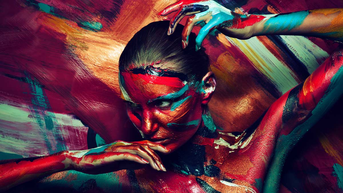 A woman with paint all over her body.